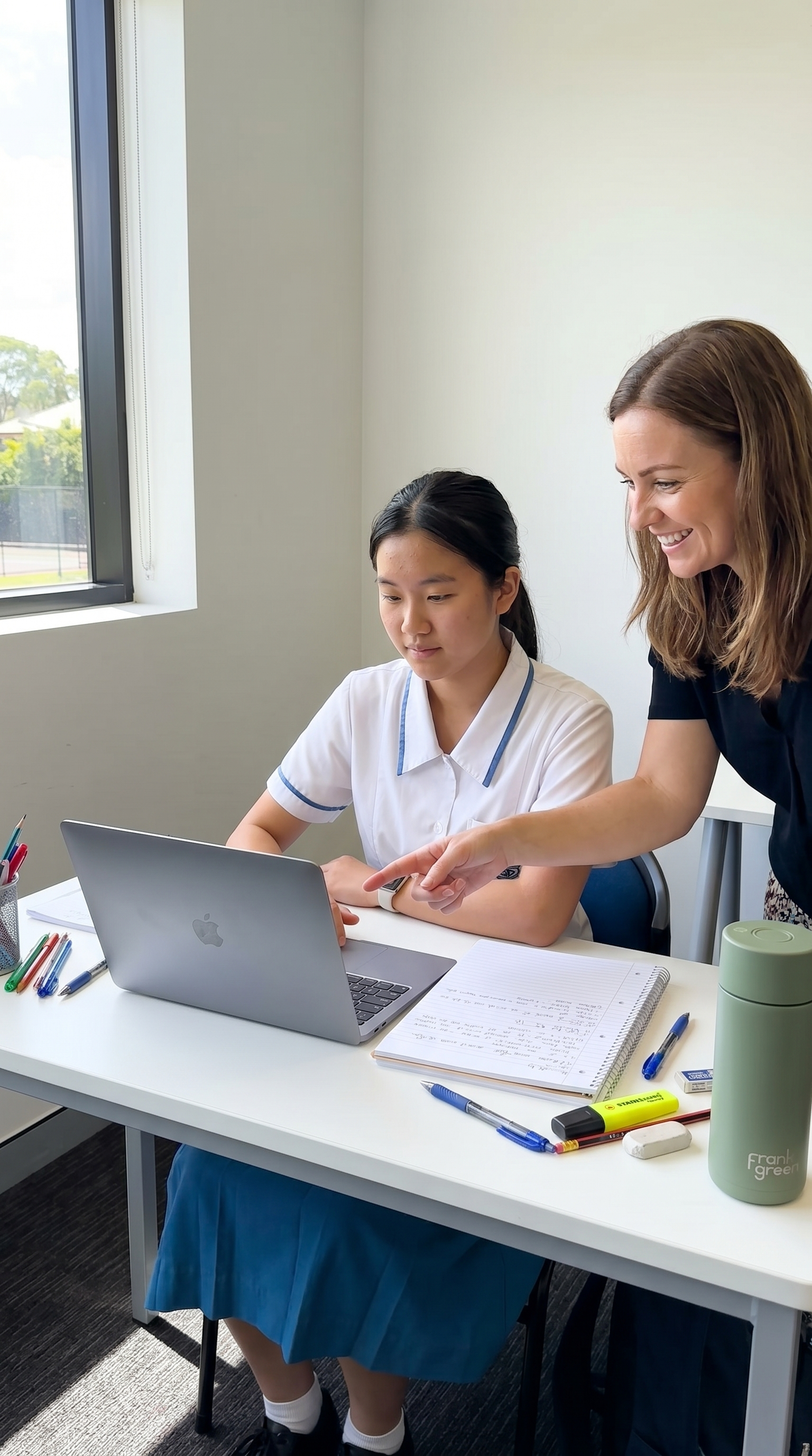 One on one tutoring with a laptop